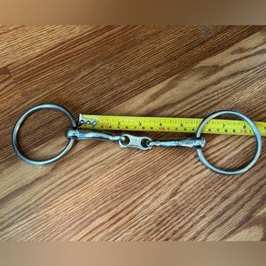 - used 5.5” loose ring French link snaffle bit